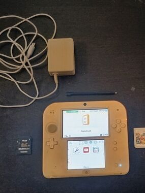 Nintendo 2DS Handheld Console Scarlet Red &Super Mario Bros 2& Super Smash Bros